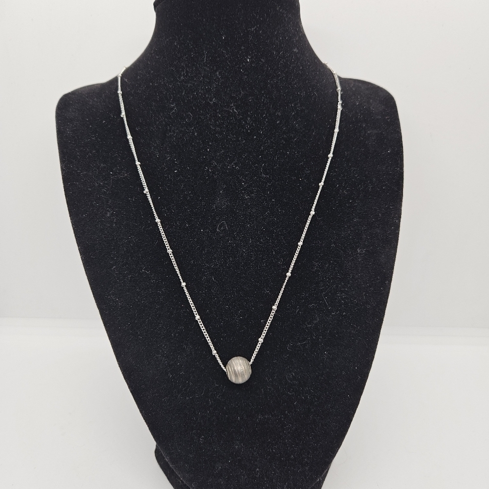 silver tone chain necklace with gray banded bead